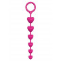 Розовая анальная цепочка с шариками-сердечками HEART BEADS - 23 см. (Dream Toys 21495)