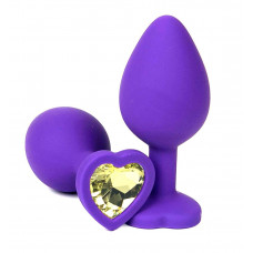 Фиолетовая силиконовая анальная пробка с желтым стразом-сердцем - 8 см.