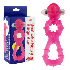 Розовое эрекционное виброкольцо с подхватом для мошонки Beefcake Heavy Rings Vibe