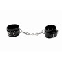 Черные кожаные наручники с заклепками