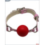 Красный пластиковый кляп-шар с фиксацией розовыми ремешками